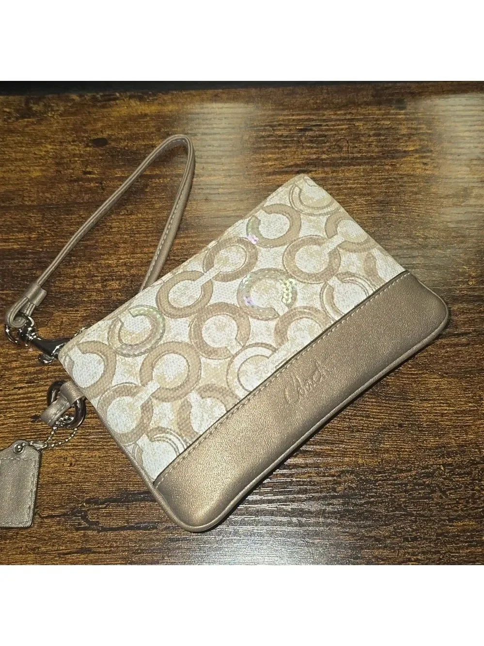 Coach shimmer bronze wristlet bag